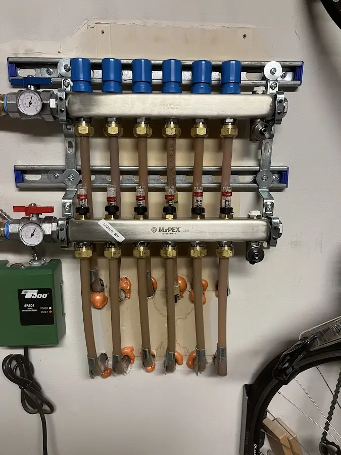 Plumber performing Gas Line Installation at a residential property in Ottawa Hills